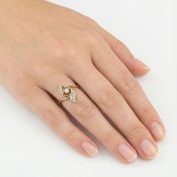 Кольцо из комбинированного золота с бриллиантами